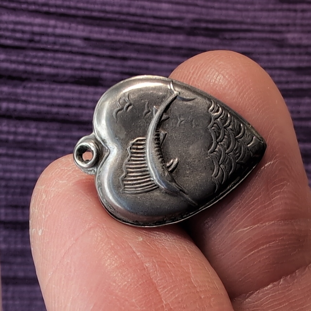 Antique sterling silver puffed heart